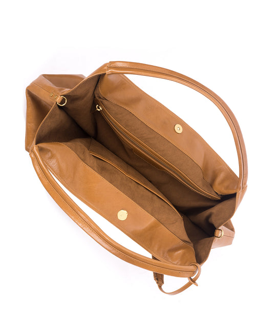 Angled over head view Hobo Tote Bag in Tan Cracked Leather with Brass Hardware wide open with magnetic closure 