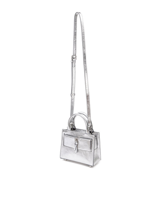 Angled over head view of wide open Kuei Bag in silver crinkle leather with silver handle leather and silver zipper hanging from strap