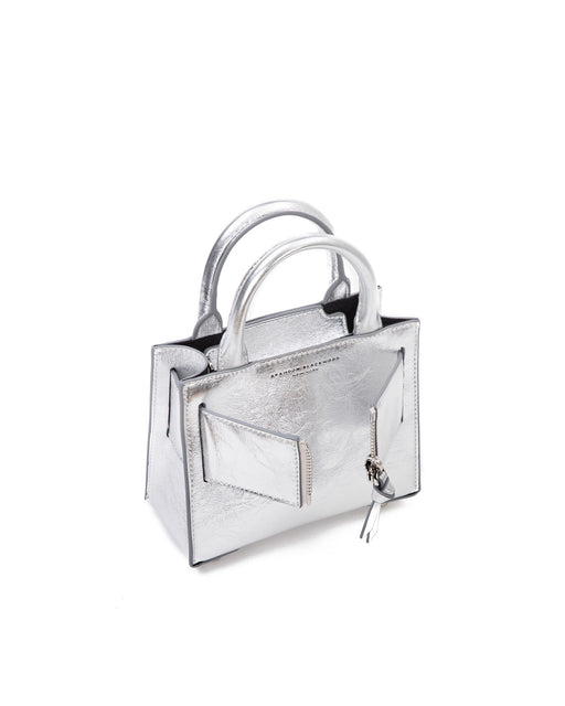 Angled over head view of wide open Kuei Bag in silver crinkle leather with silver handle leather and silver zipper