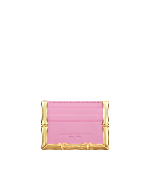 Front of Bamboo B Cardholder in Pink leather with 6 card slots and brass bamboo embossed trim