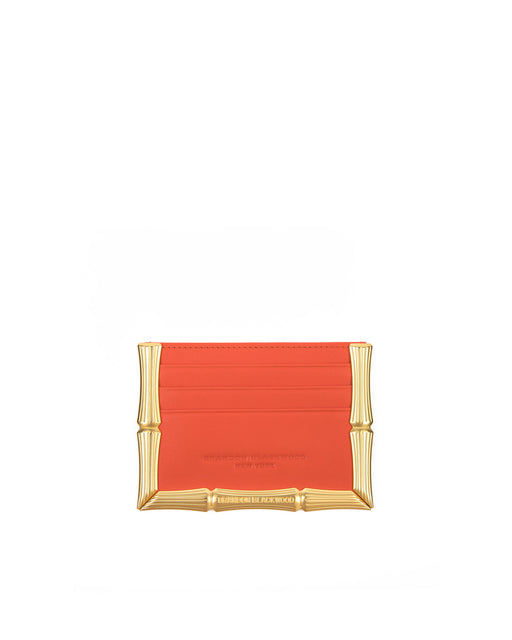 Front of Bamboo B Cardholder in Burnt Orange leather with 6 card slots and brass bamboo embossed trim