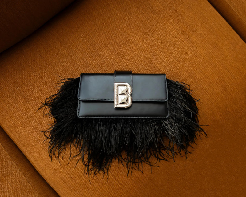 The Timeless Reign of the Black Handbag