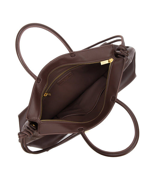 Angled over head view of Rouched Tote Bag in Smooth Brown Leather with Brass Hardware with wide open zipper 