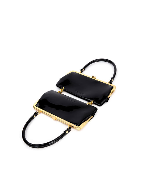 Angled over head view of wide open Gemini Purse in black leather with black leather handle brass clasp buckle
