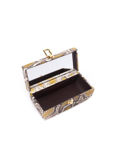 Overhead view of the Vanity Purse in Python Leather with 24K Gold Plated Brass Hardware  with purse open with mirror inside 