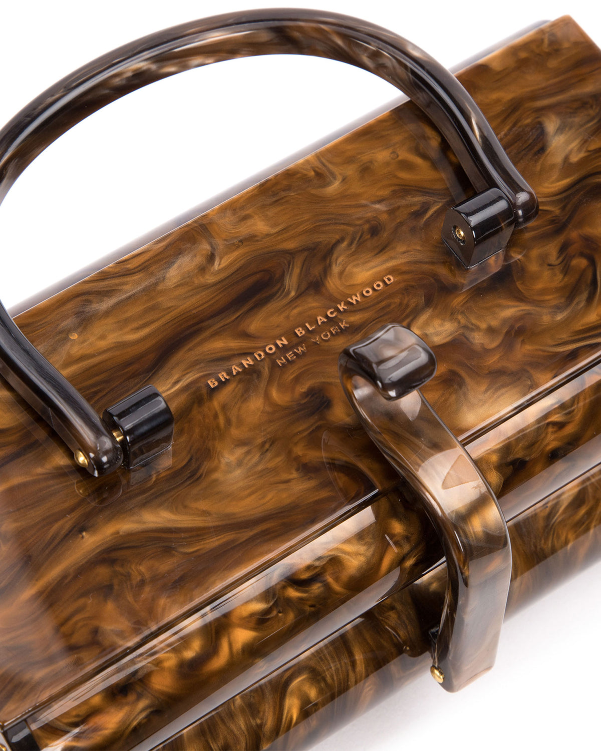Angled close up of Brown marble acrylic duplex purse