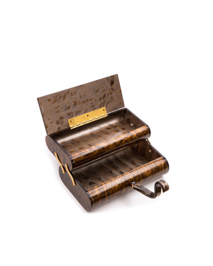 Angled close up of open pivoting double decker compartments brown marble duplex purse thumbnail 2