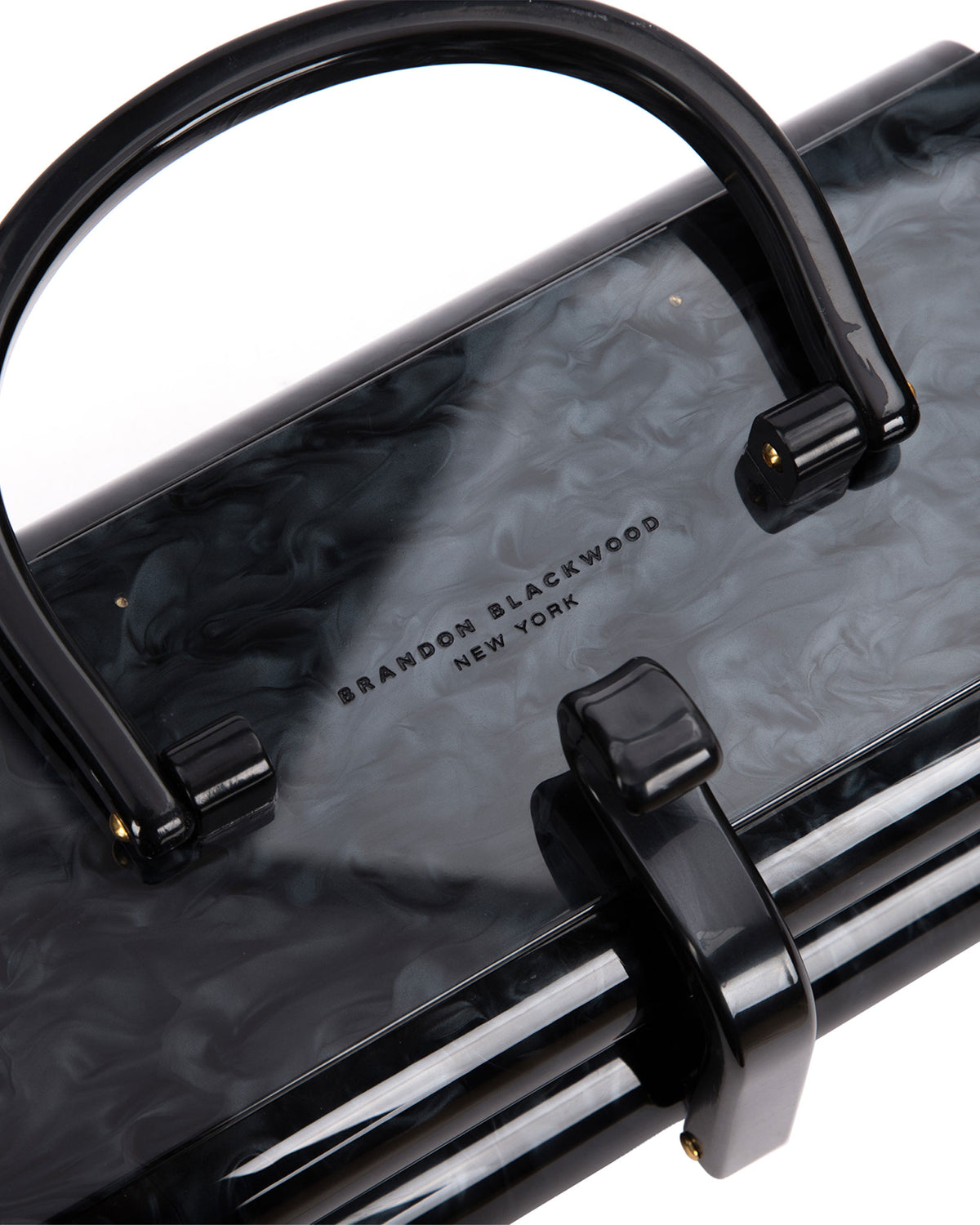 Angled close up of Black marble acrylic duplex purse