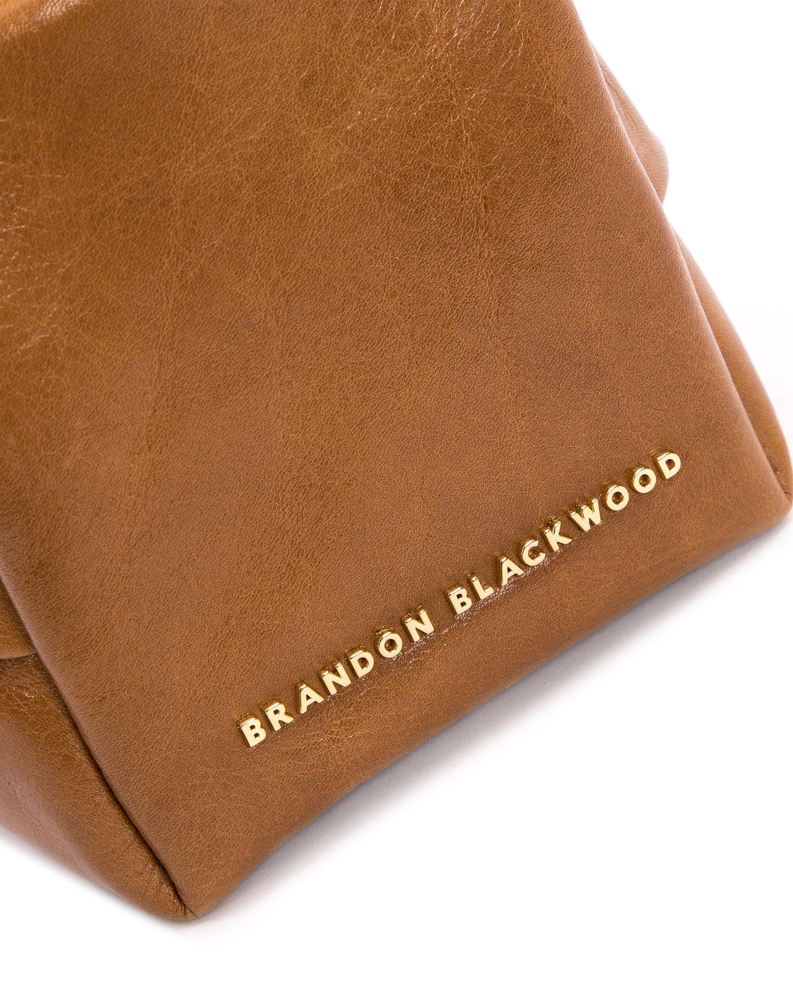 Angled close up  of Valentina Shoulder Bag in Tan Cracked Leather with Brass Chain Handle