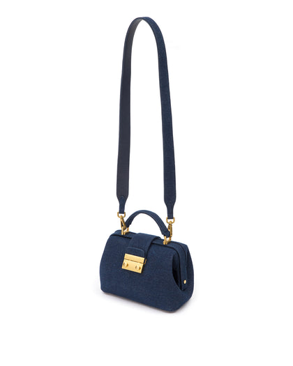 Elizabeth Doctor Bag in dark denim with dark denim handle brass clasp buckle, hanging from cross body strap thumbnail 5