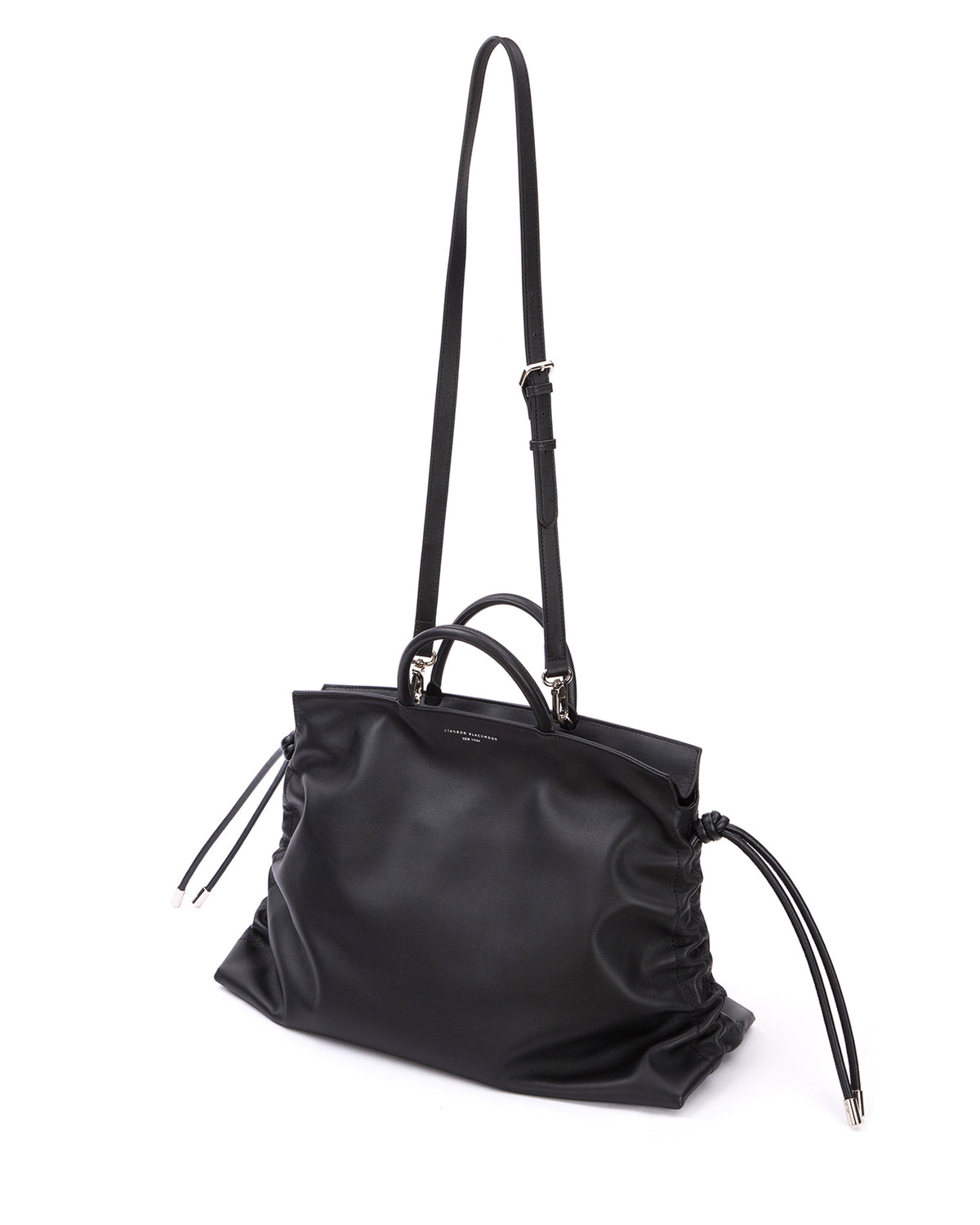 Rouched Tote Bag in Smooth Black Leather with Silver Hardware hanging with strap