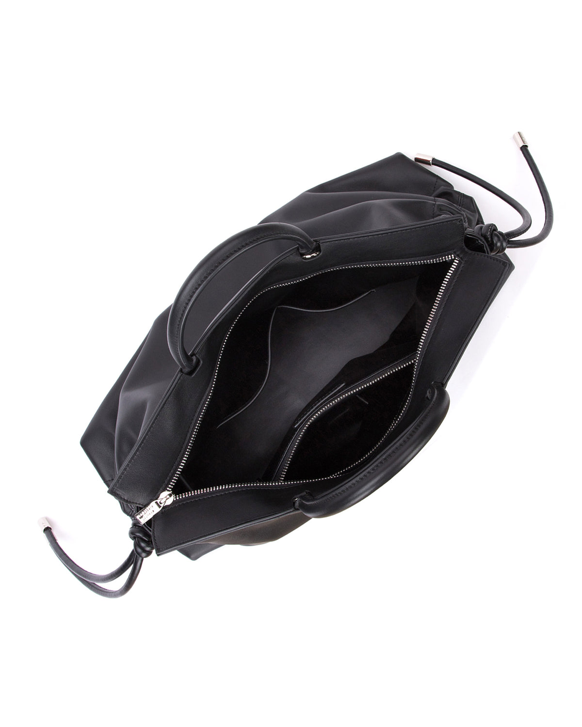Angled over head view Rouched Tote Bag in Smooth Black Leather with Silver Hardware with wide open zipper 