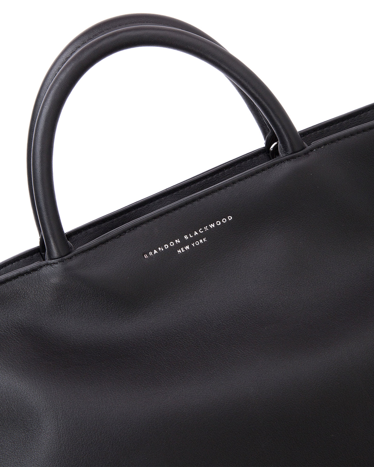 Angled close up Rouched Tote Bag in Smooth Black Leather with Silver Hardware