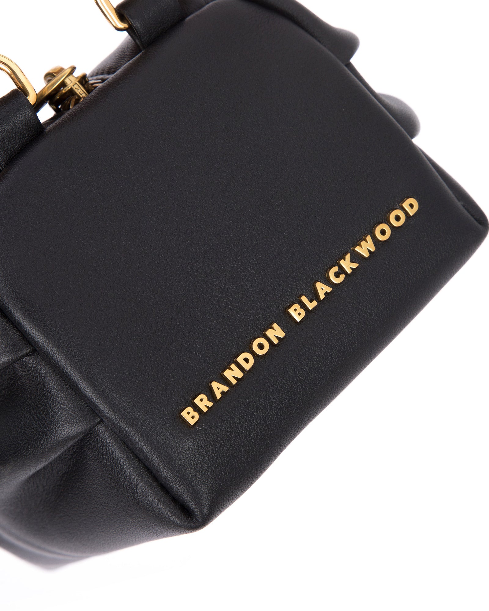 Angled close up of Mini Valentina with black smooth leather 