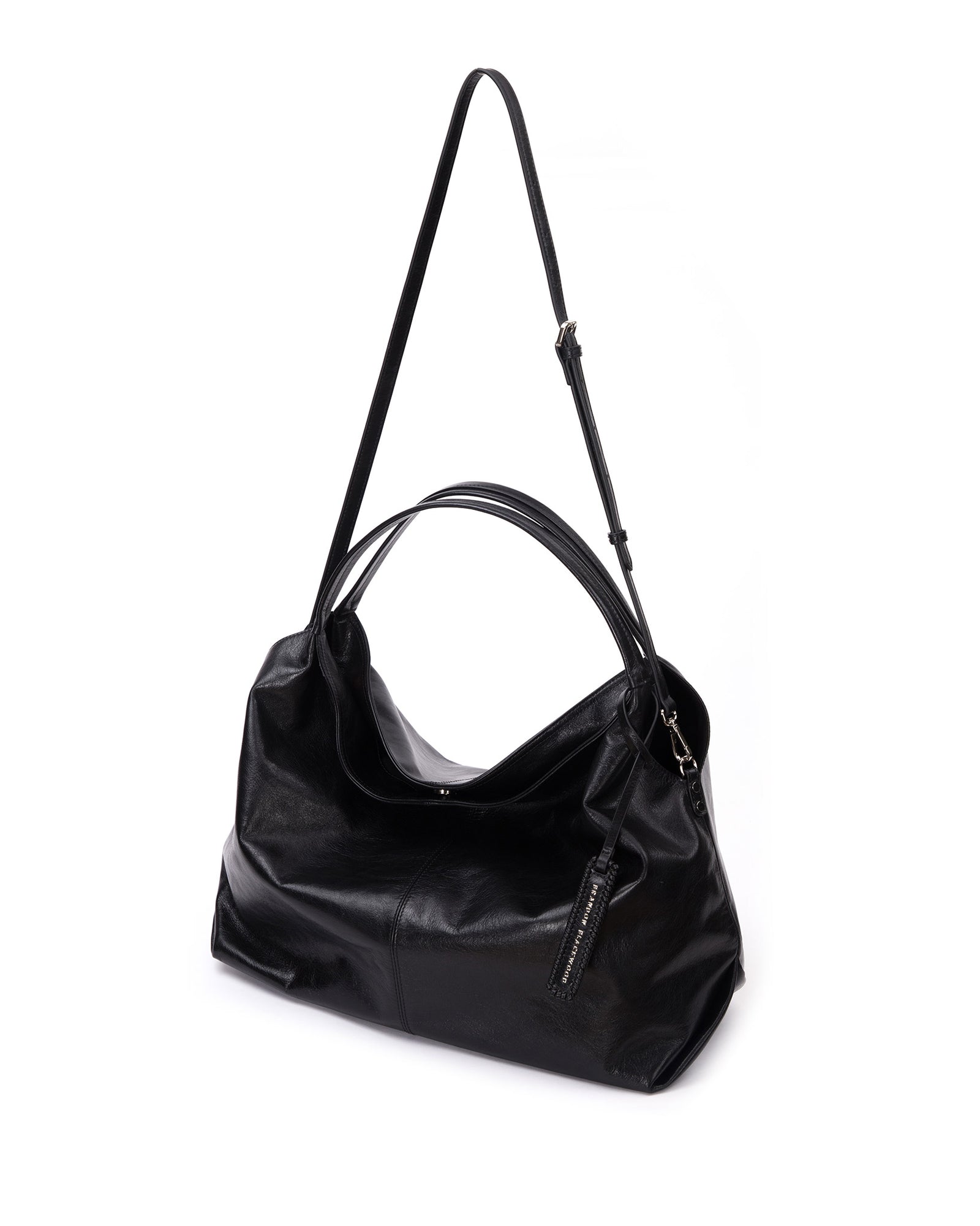 Hobo Tote Bag in Black Cracked Leather with Silver Hardware hanging with strap