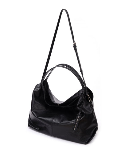 Hobo Tote Bag in Black Cracked Leather with Silver Hardware hanging with strap thumbnail 7