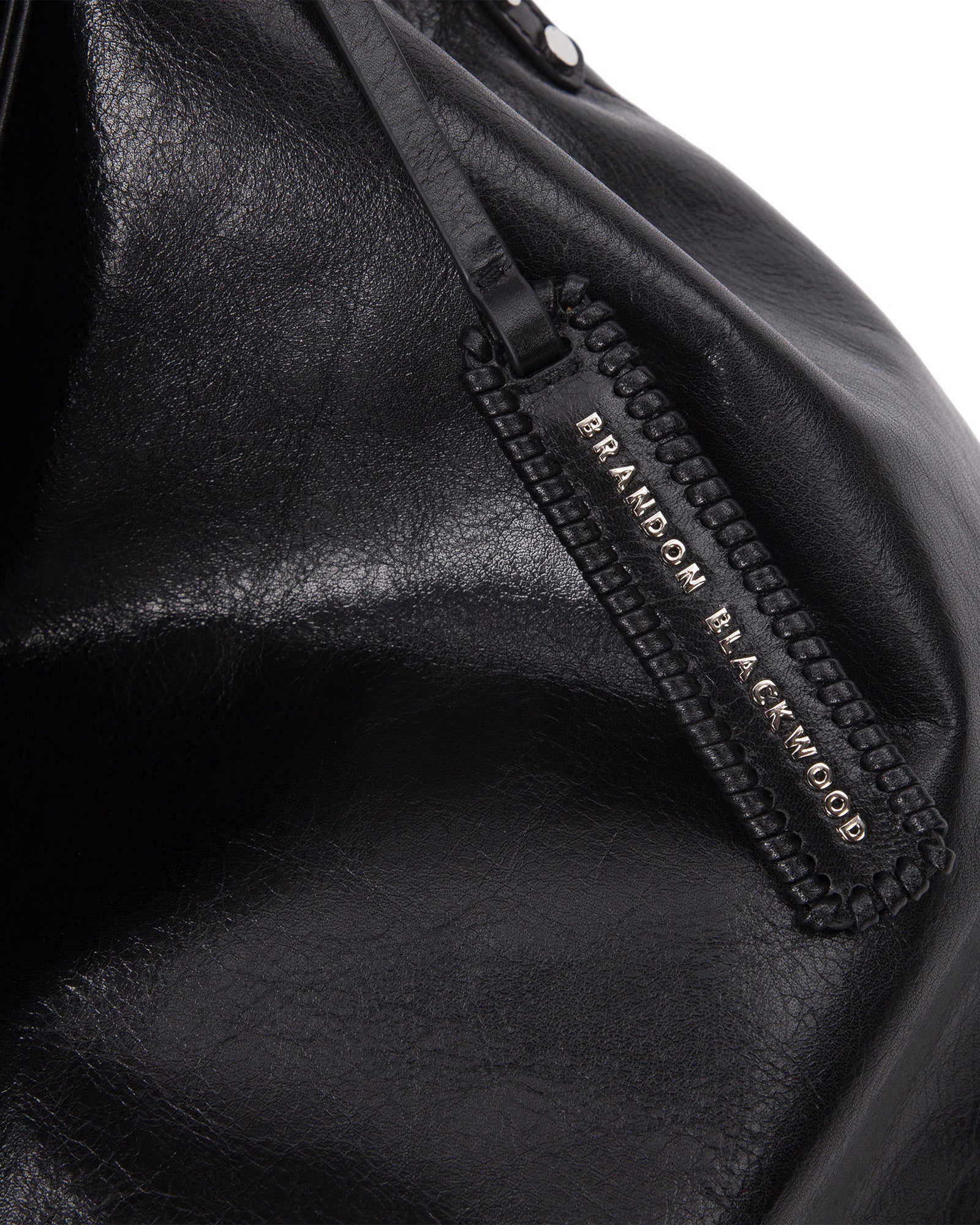 Angled close up Hobo Tote Bag in Black Cracked Leather with Silver Hardware