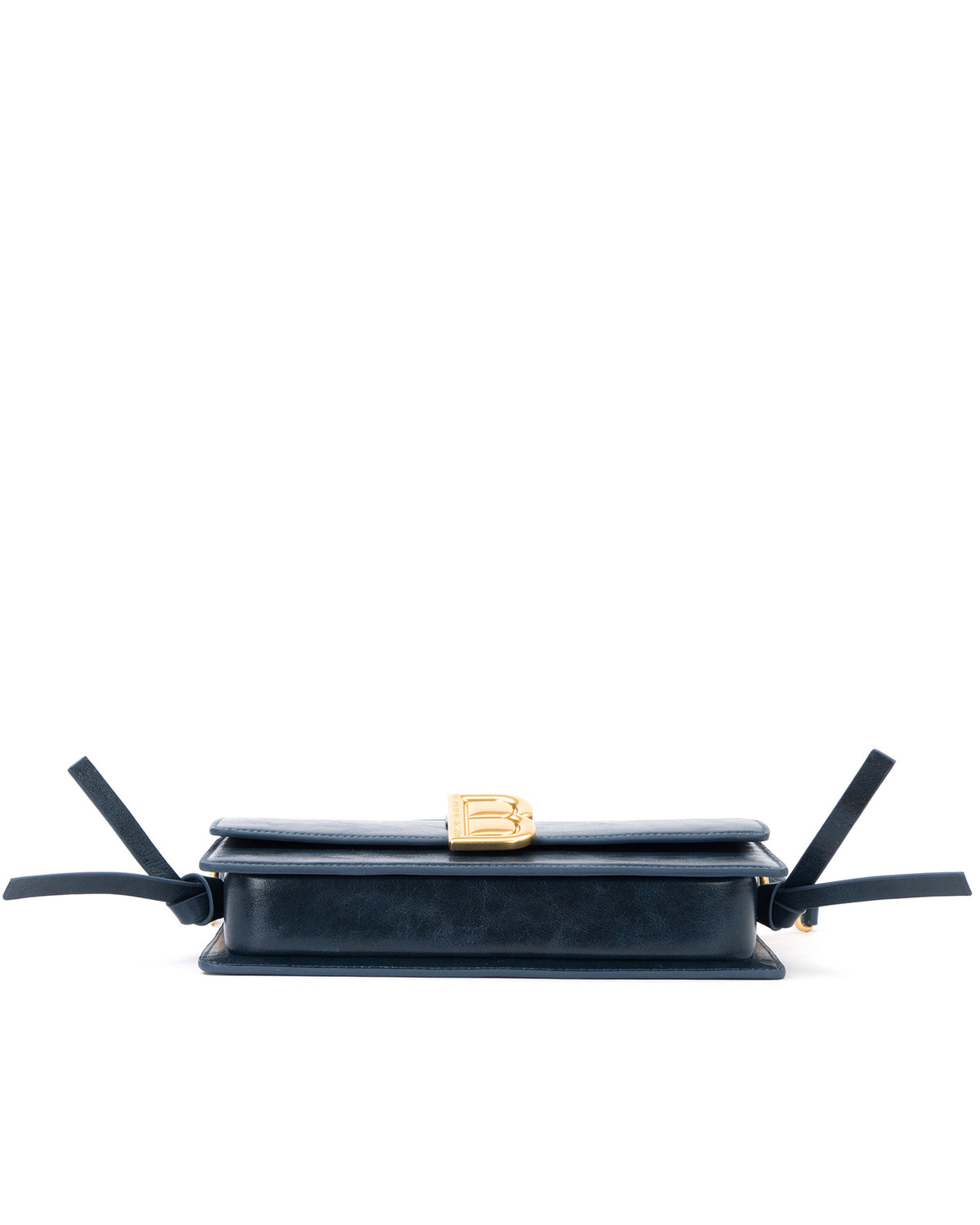 Bottom of Nia Bag with navy cracked leather four metal feet