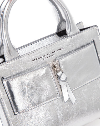 Angled close up of Kuei Bag in silver crinkle leather  thumbnail 3