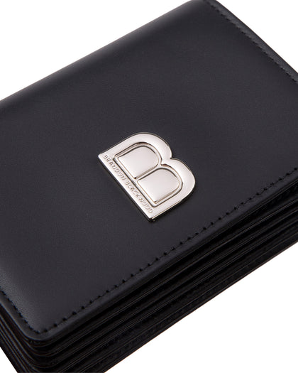 Angled close up of Accordion Card case, black leather body, silver Brandon Blackwood buckle, wristlet thumbnail 3
