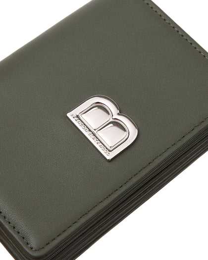 Angled close up of Accordion Card case, green leather body, silver Brandon Blackwood buckle, wristlet thumbnail 3