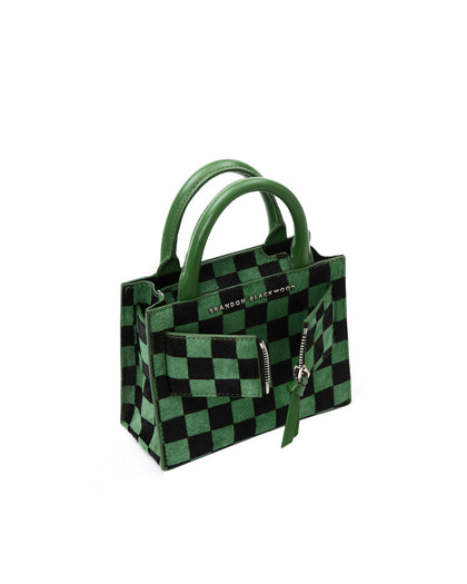 Angled over head view of wide open Kuei Bag in black and green checkered ponyhair with ponyhair handle ponyhair silver zipper  thumbnail 4