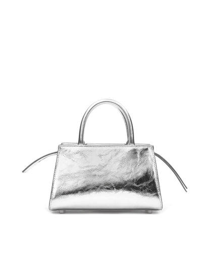 Back of Arlen Bag, metallic silver leather body with leather handle, exaggerated zipper detail Arlen Bag, metallic silver leather body with leather handle, Brandon Blackwood hardware logo, exaggerated zipper detail thumbnail 5