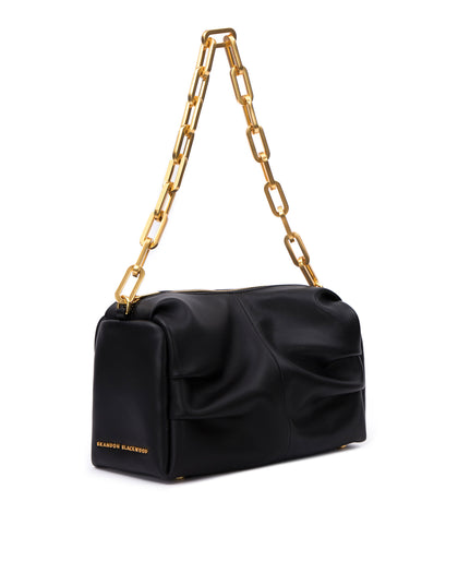 Angled close up of Valentina Shoulder Bag in Black Smooth Leather with Brass Chain Handle thumbnail 4