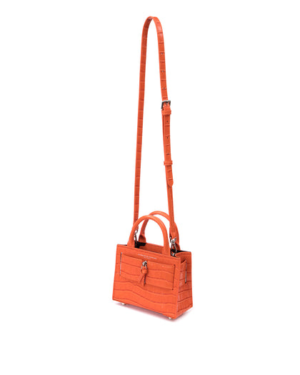 Angled over head view of wide open Kuei Bag in orange croc embossed leather with orange croc embossed handle orange croc embossed silver zipper hanging from strap thumbnail 4
