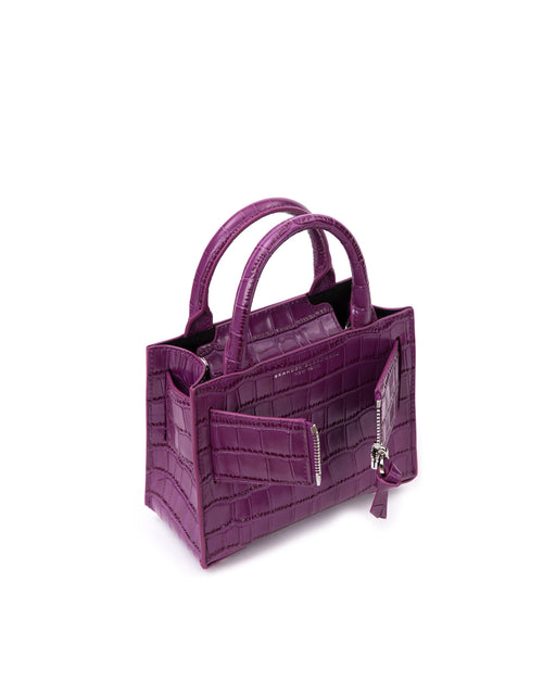 Angled over head view of wide open Kuei Bag in purple croc embossed leather with purple croc embossed handle purple croc embossed silver zipper 