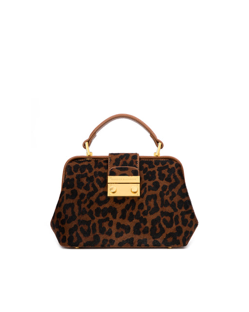 Front of Elizabeth Doctor Bag in leopard ponyhair with ponyhair handle brass clasp buckle