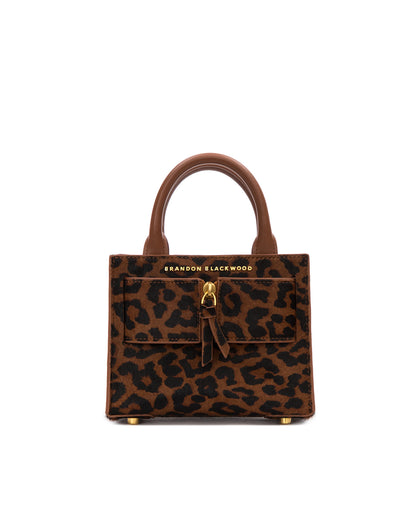 Front of Kuei Bag in brown and black leopard print ponyhair with ponyhair brass zipper  thumbnail 1