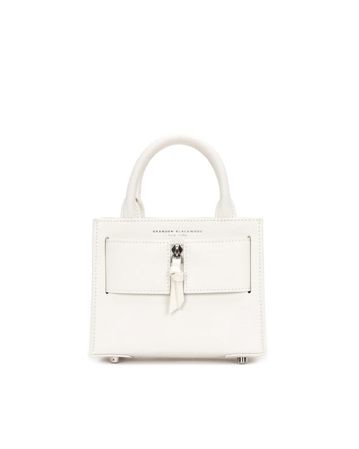 Front of Kuei Bag in white smooth leather with silver and leather zipper 