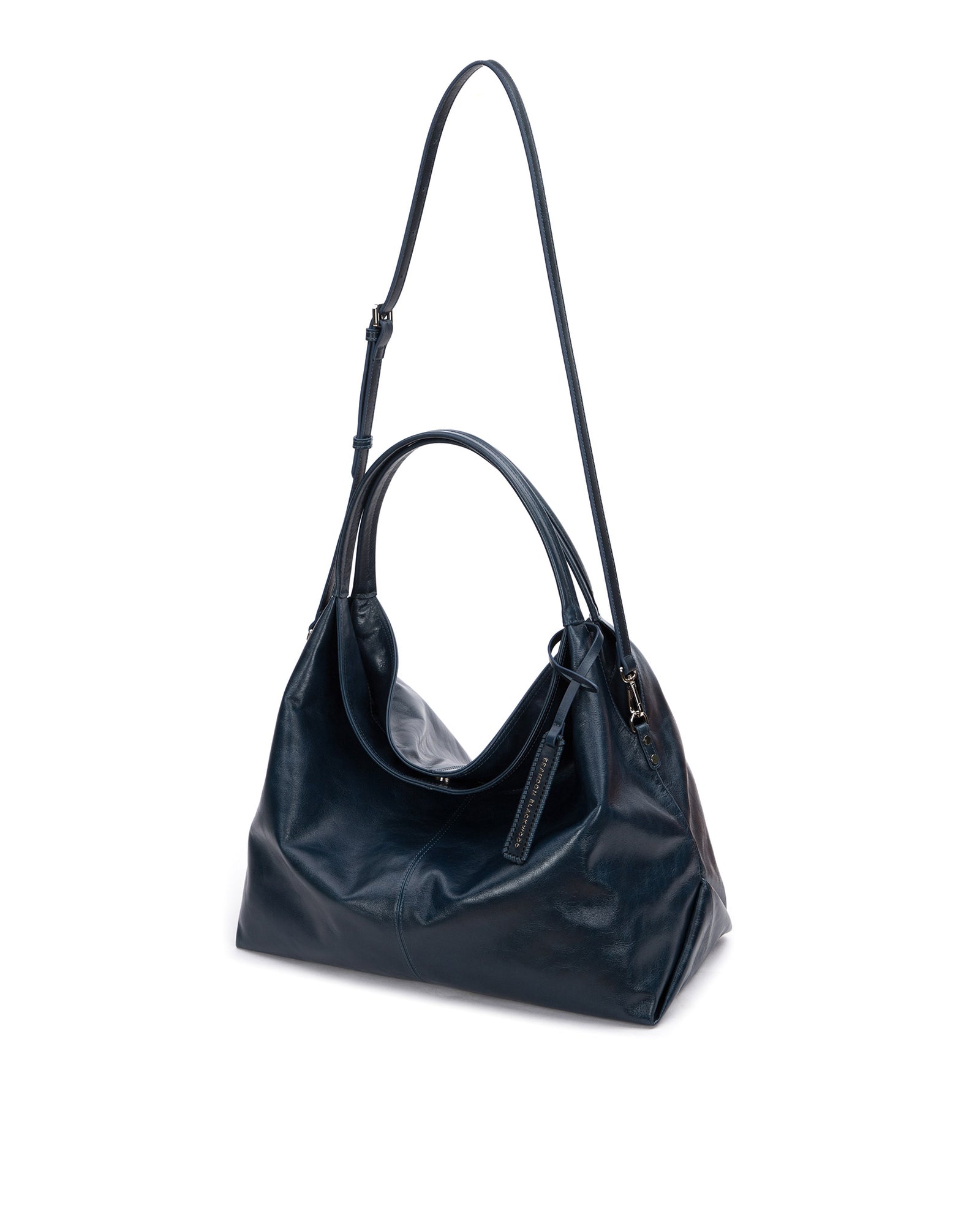 Hobo Tote Bag in Blue Cracked Leather with Silver Hardware hanging with strap