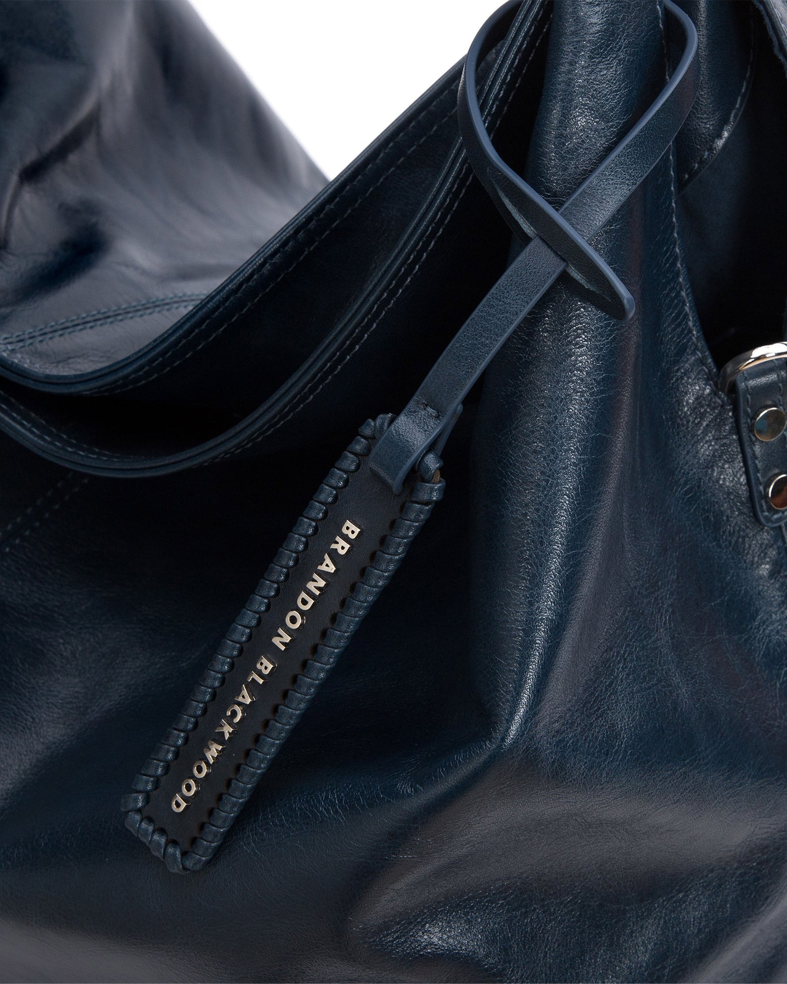 Angled close up Hobo Tote Bag in Blue Cracked Leather with Silver Hardware