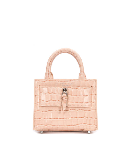 Front of Kuei Bag in cream croc embossed leather with cream croc embossed silver zipper 